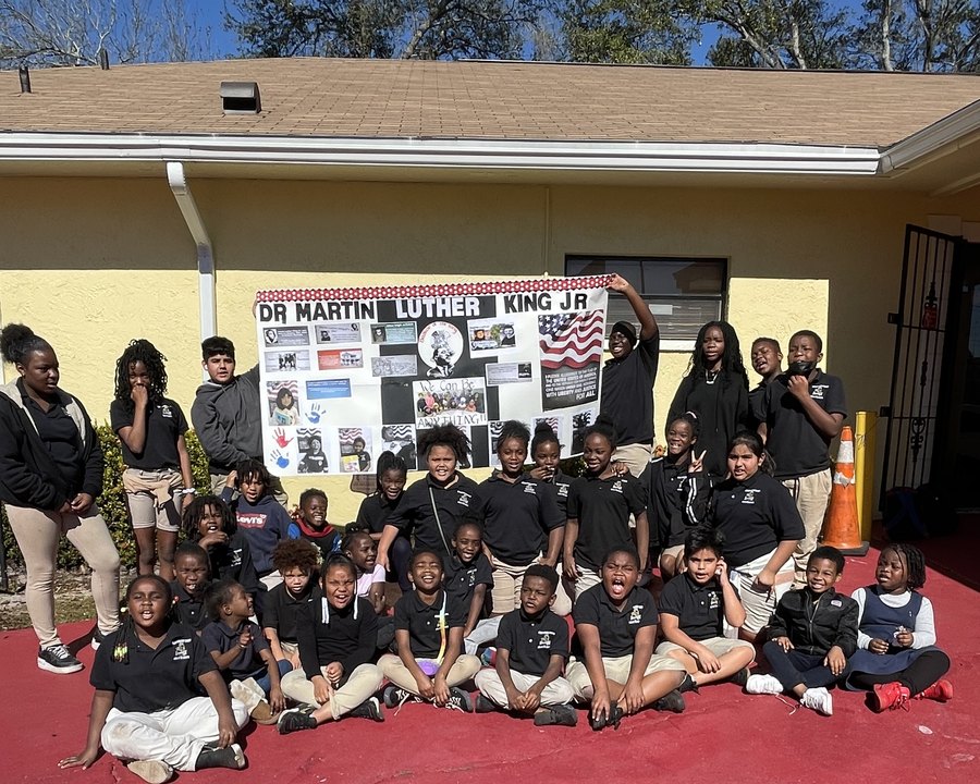 Scholars Christian Academy and First Victory youth students celebrating learning and heritage